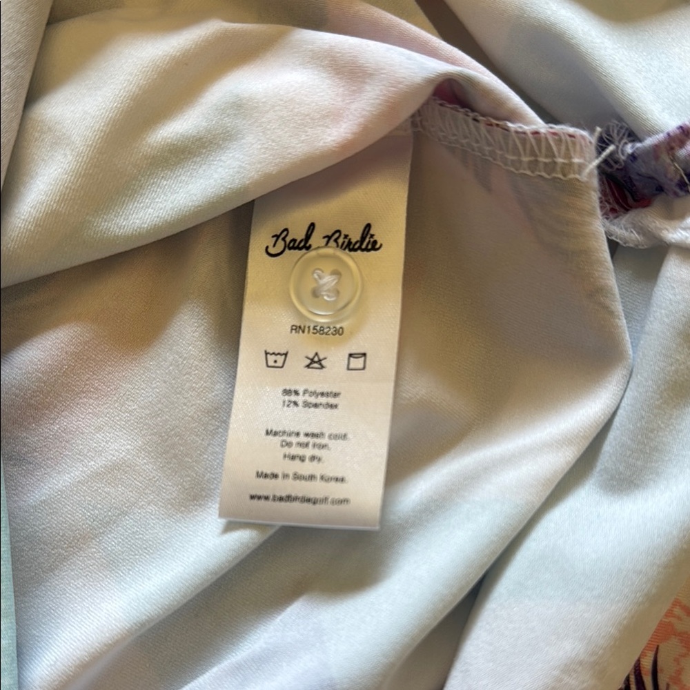 Bad Birdie Pink and Blue Polo Shirt with Modern Geometric Design - Picture 5 of 7